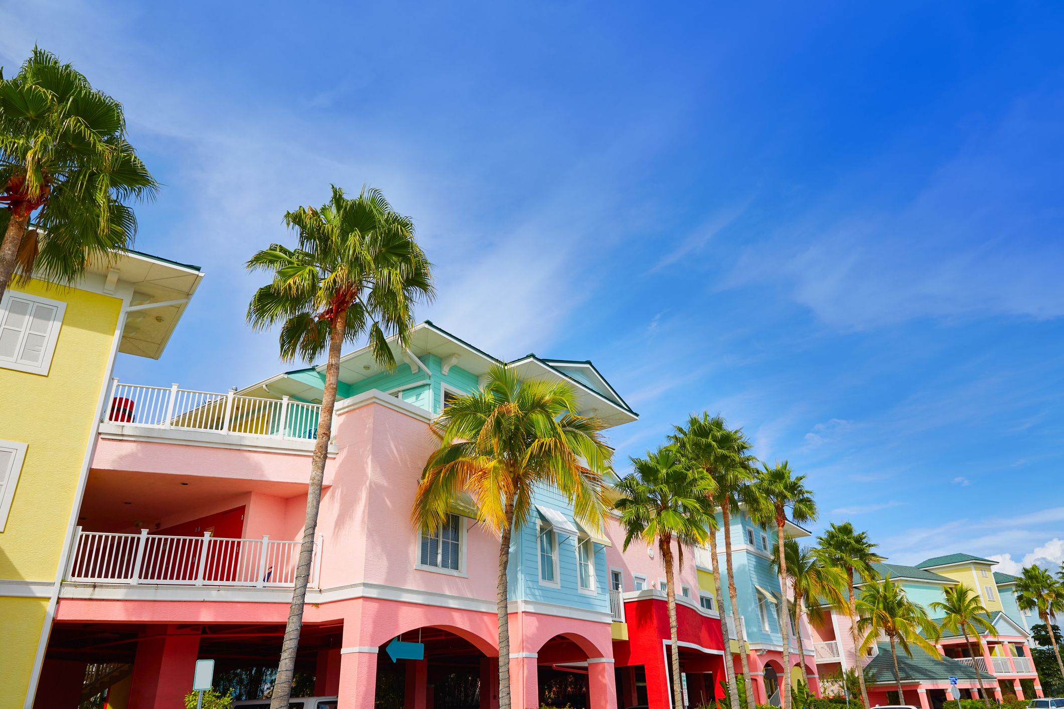Florida Fort Myers colorful building facades and palm trees.